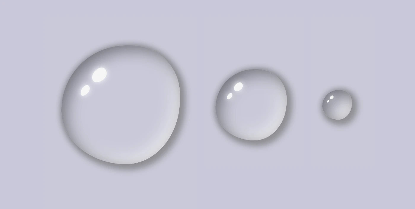An image showing three different gray CSS water drops with two small, almost white oval shapes like shiny effects in each.